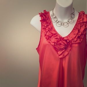 Melon colored, ruffle detail shell